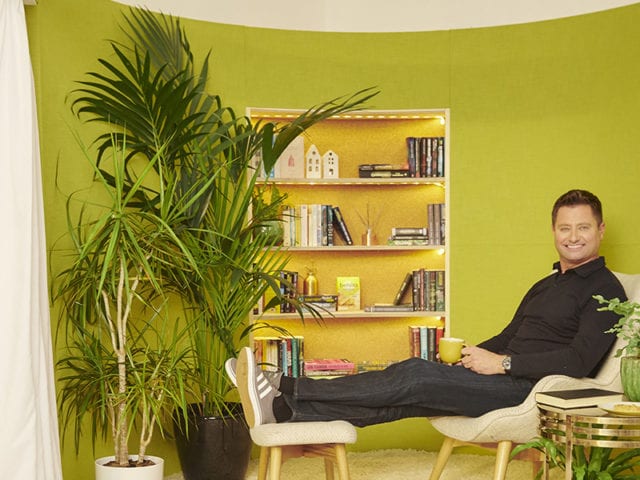 George Clark reading book in Recharge Retreat | Good Homes Magazine