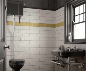 White tiled bathroom with black toilet and dark basin, goodhomesmagazine.com