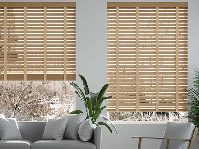 Venetian blinds in light brown in white and grey living room, goodhomesmagazine.com