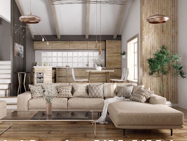 coffee table and l-shaped sofa with modern kitchen behind