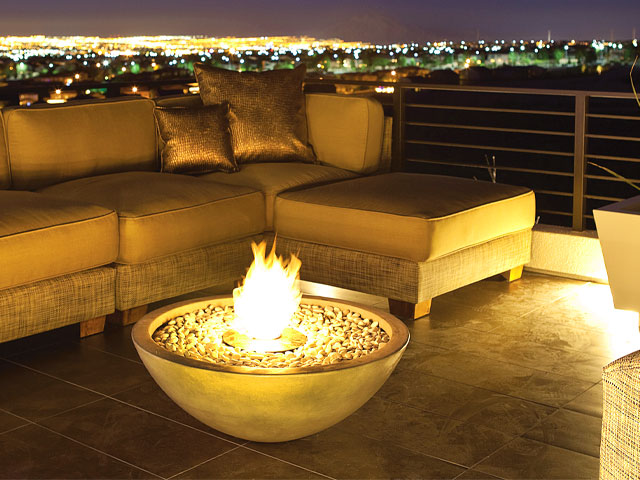 Bioethanol Fire Pit with expensive garden furniture and views over the city