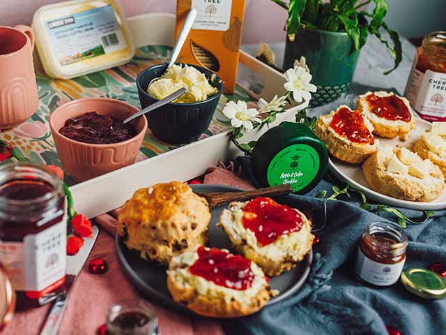 Scones with jam and cream for afternoon tea, goodhomesmagazine.com