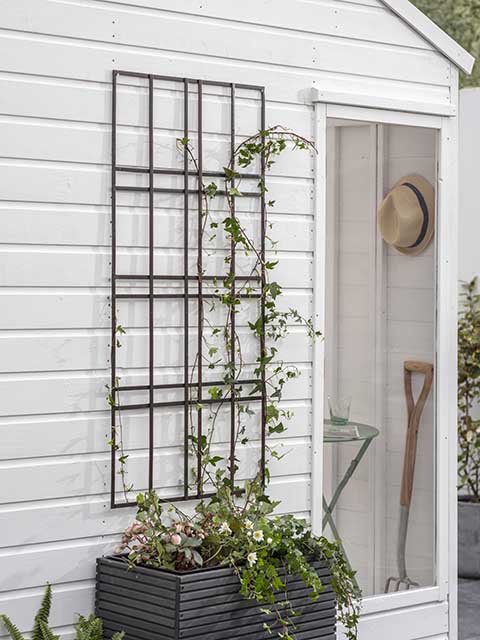 Small garden ideas trellis and planter, goodhomesmagazine.com