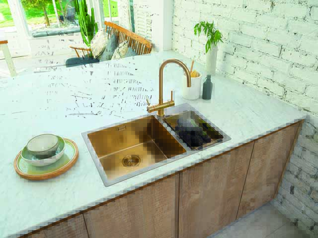 gold and steel kitchen sink with small side sink or bowl and a half