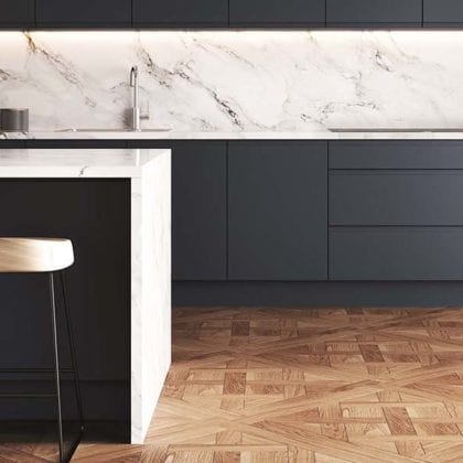 Trend Interiors dark kitchen with marble splashback goodhomesmagazine.com