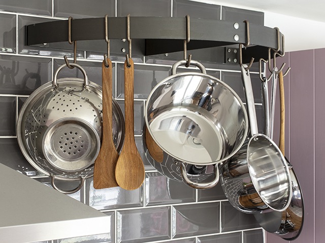 Annemarie Goodchild kitchen makeover saucepan rack | Contemporary kitchen makeover: It's my old space with a new look | Image David Giles | Good Homes Magazine