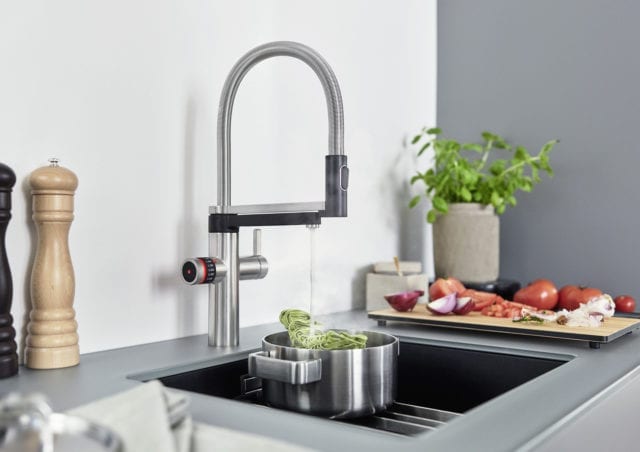 kitchen interior with contemporary grey sink and worktop, stainless-steel Blanco Evol-S Pro Hot and Filter Tap