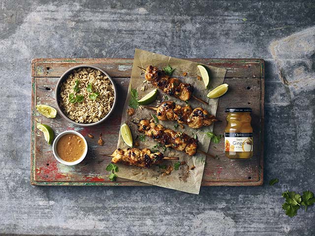 Chicken skewers on a decorative wooden plank - Barbecue recipes - Goodhomesmagazine.com