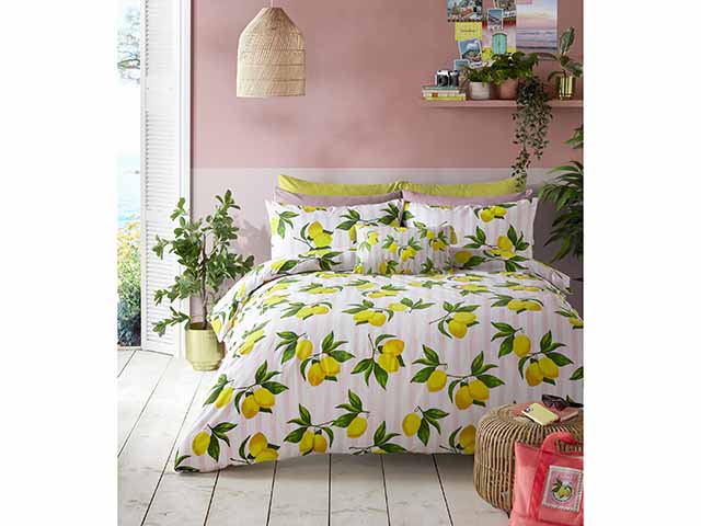 Lemon bedding in pink summer bedroom, goodhomesmagazine.com