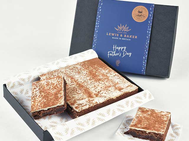 A gift box with a large slab of cream-topped brownies - Father's Day - Goodhomesmagazine.com