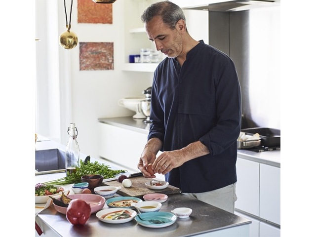 Yotam Ottolenghi preparing food in kitchen | Good Homes Magazine