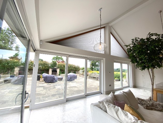 Gable Shaped Window with Home Automated Smart Blinds