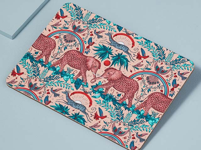 Wipe clean pink placemat with elephant jungle pattern, goodhomesmagazine.com