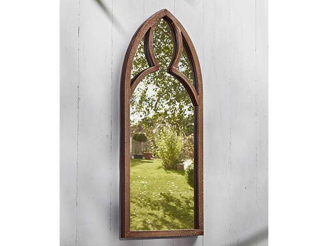 Thin arched mirror that looks gothic in style - Garden mirrors - Goodhomesmagazine.com