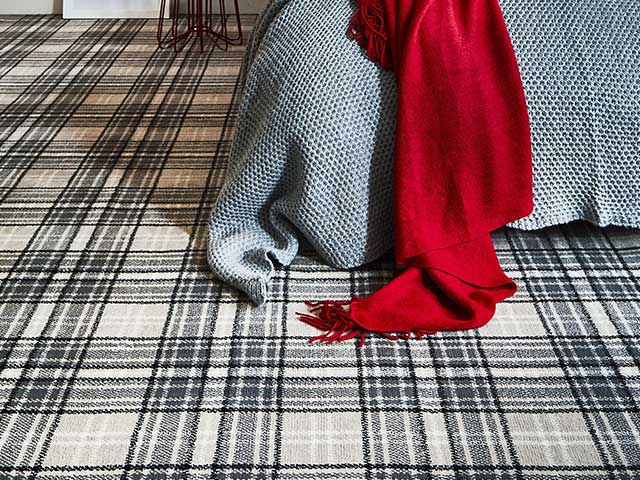 Carpet with a plaid pattern in a neutral colour scheme - Statement bedrooms - Goodhomesmagazine.com