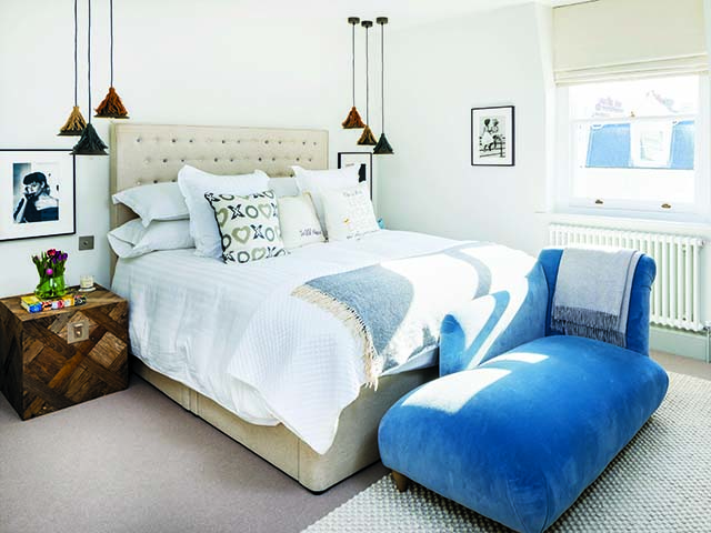 City bedroom, pendant bedside lights, upholstered headboard, velvet chaise, goodhomesmagazine.com