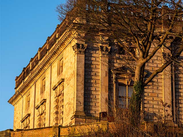 Exterior of Nottingham Castle with the sun shining on it - UK day trips - Goodhomesmagazine.com