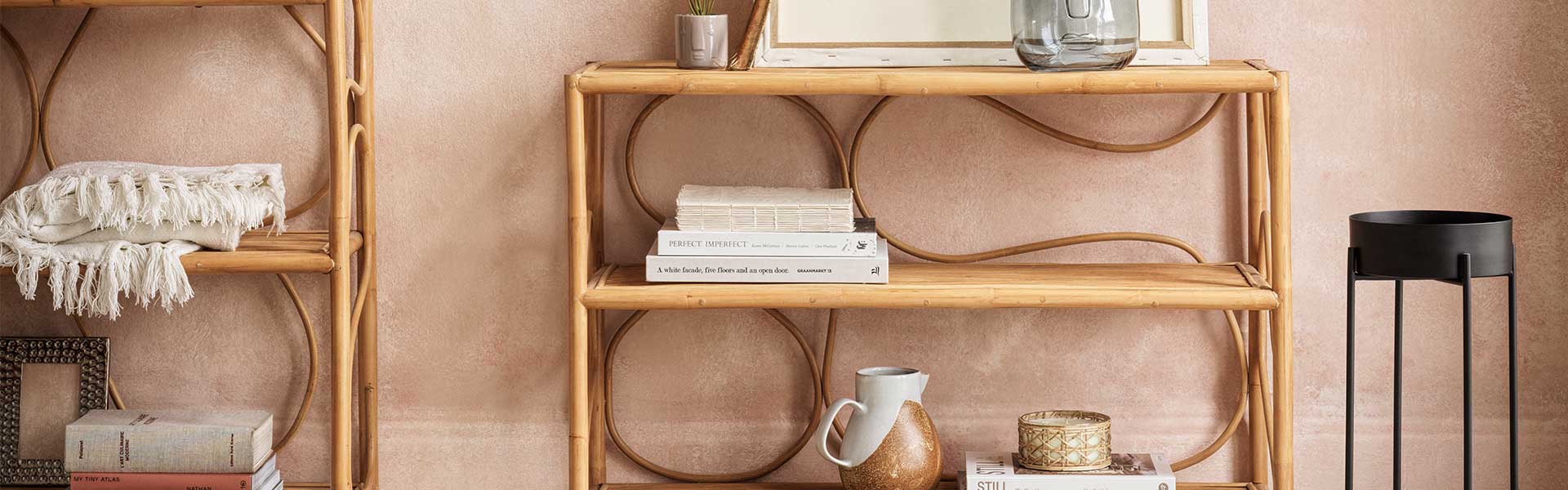 Two rattan shelving units in a neutral toned room - Rattan - Goodhomesmagazine.com