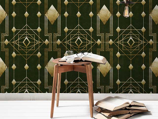 A 1920s style wallpaper featuring metallic gold geometric patterns on a rich forest green background - Instagram wallpaper trends - Goodhomesmagazine.com
