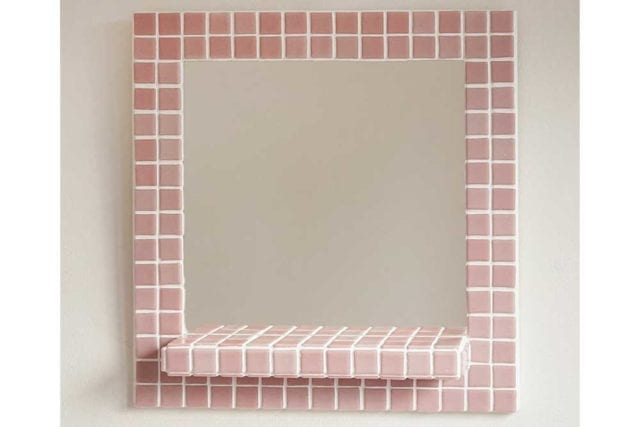 Pink tiled square mirror with white grouting and a shelf - Tile decor trends - Goodhomesmagazine.com