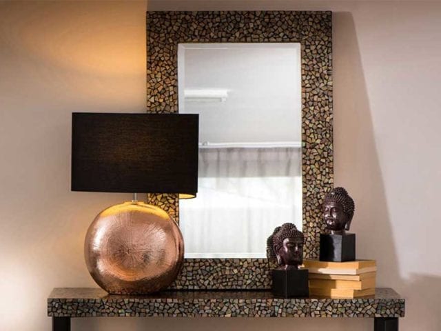 Mosaic mirror on a table top with the same pattern - Tile decor trends - Goodhomesmagazine.com