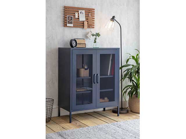 Navy blue metal storage locker with metal grating on the door panels - Metal storage lockers - Goodhomesmagazine.com 