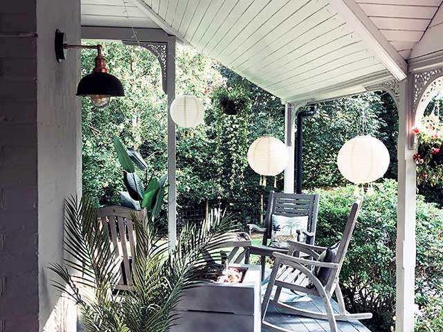 Hanging lanterns on covered over decking space