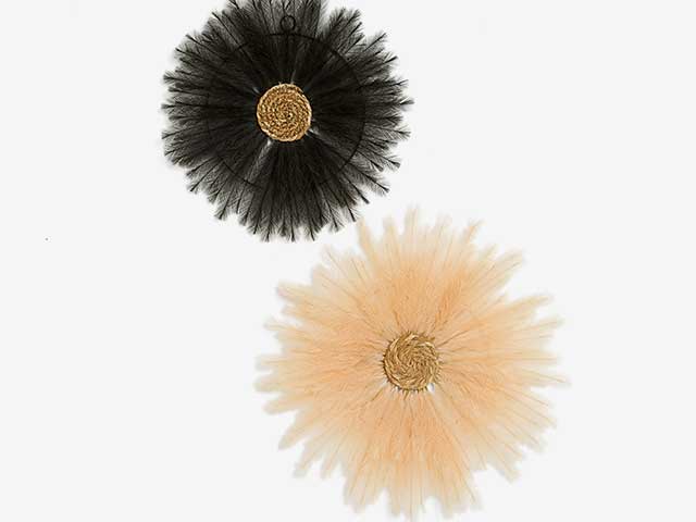 Three dried flower wreaths on white background