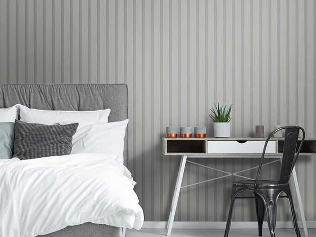 Stripy grey wood panelling wallpaper in a bedroom - Grey bedrooms - Goodhomesmagazine.com