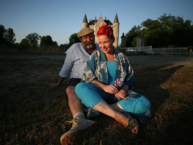 Dick and Angel Strawbridge in front of their French Chateau