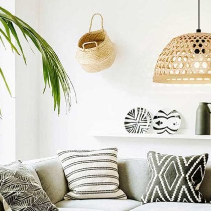 Woven rattan ceiling lampshade above a sofa in a living room - Living room lighting - Goodhomesmagazine.com