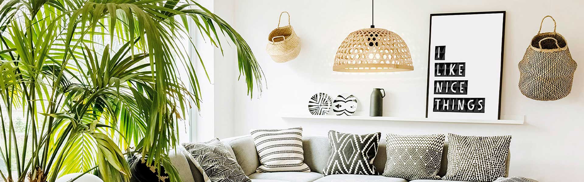 Woven rattan ceiling lampshade above a sofa in a living room - Living room lighting - Goodhomesmagazine.com