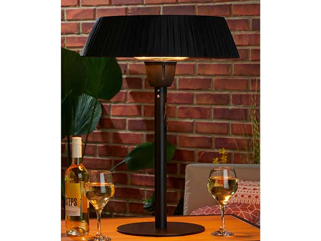 Black table top patio heater in the shape of a lamp with a fabric shade - Outdoor cinema - Goodhomesmagazine.com