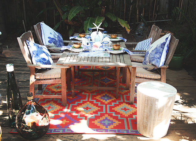  Outdoor dining inspiration: Try a vibrant rug under the table, like this bright outdoor rug from Cuckooland