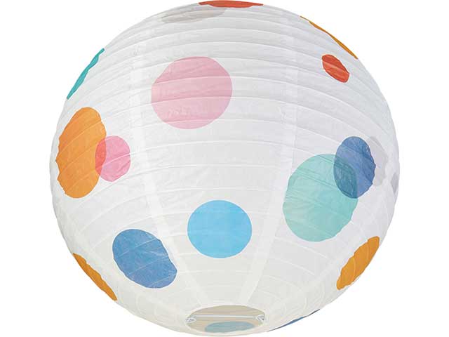 Paper lampshade with colourful polka dots on white background