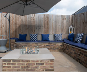 Couple wins garden transformation competition with Love Island inspired fire pit area
