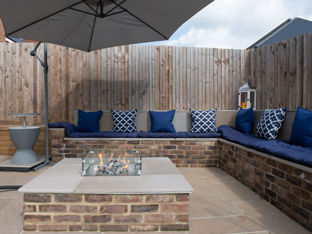 Couple wins garden transformation competition with Love Island inspired fire pit area