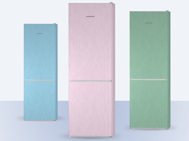 three modern fridges in pastel colours; blue pink and green