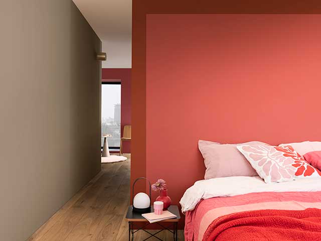 One colour instagram feature wall in bedroom with wooden floor