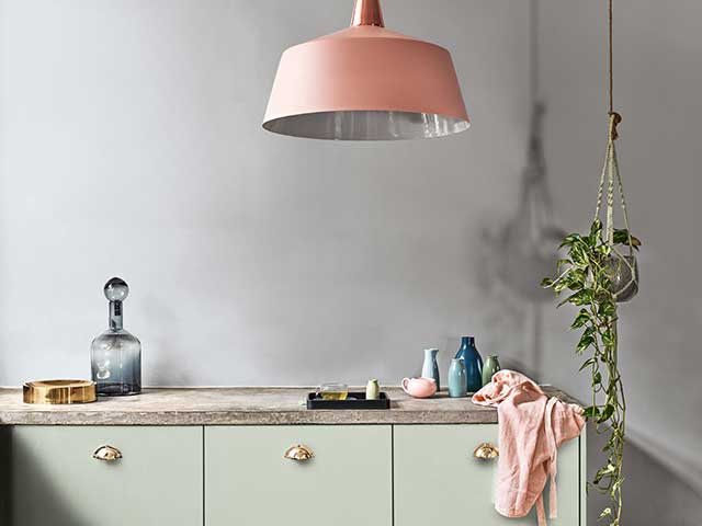 Kitchen space with grey instagram feature wall