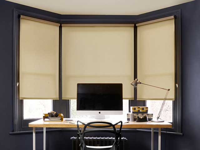 Acacia sands roller blinds in home office in larger window