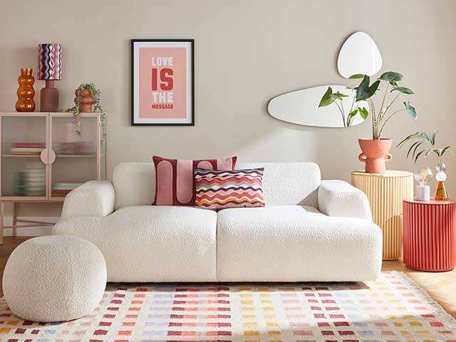 Crean sofa with colourful Henry Holland interior buys