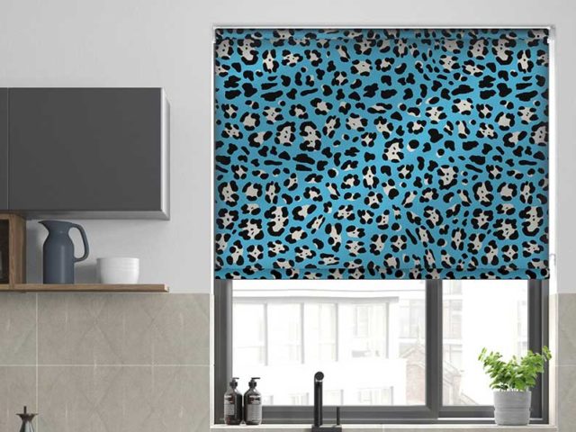 Blue animal print roller blinds in kitchen