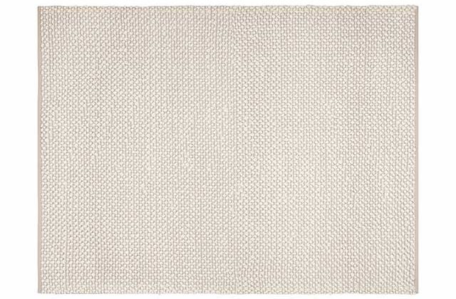 Bobble rug pebble decor on white background