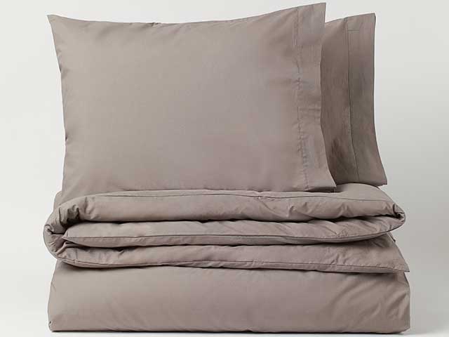Warm pebble decor duvet set and pillows on white background