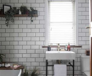 White tiled tropical bathroom with shelfie, freestanding bath and basin
