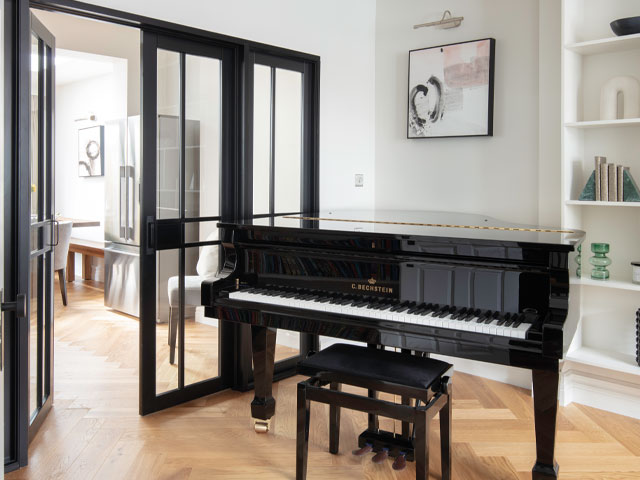 Positioning the large piano was a key factor in this property transformation