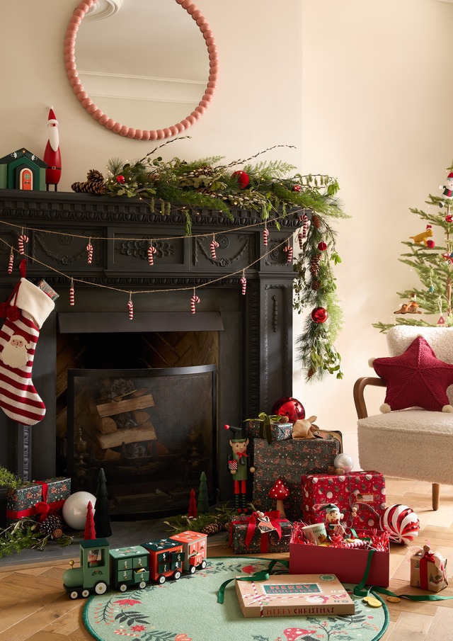 Christmas fireplace with toys and garlands