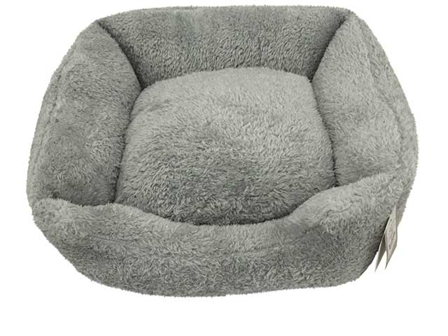 Grey soft dog bed on white background
