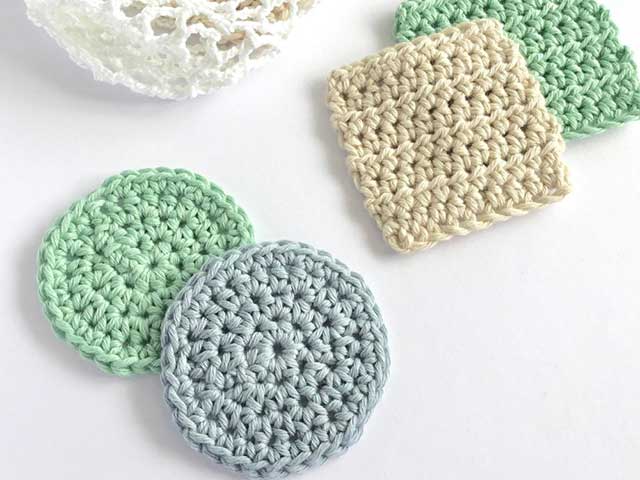 Reusable cotton pads on white background